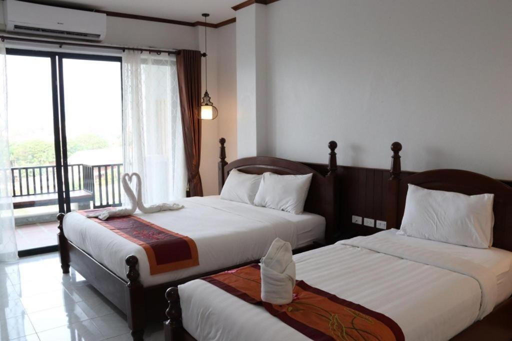 Thavisouk Riverside Hotel Ванг-Виенг Экстерьер фото