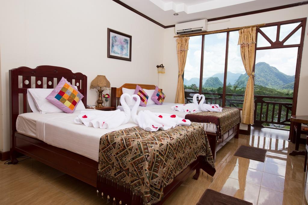 Thavisouk Riverside Hotel Ванг-Виенг Экстерьер фото